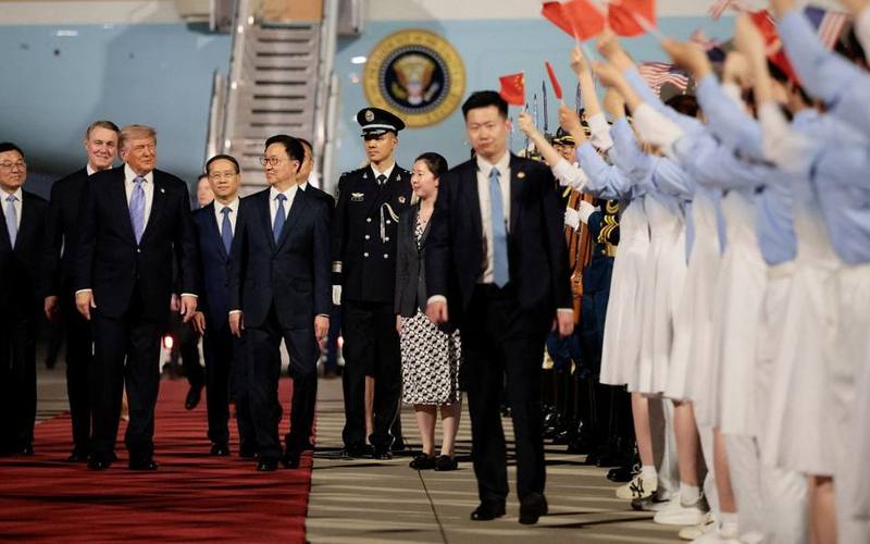 Trump Touches Down in Beijing for High-Stakes Meeting with Xi