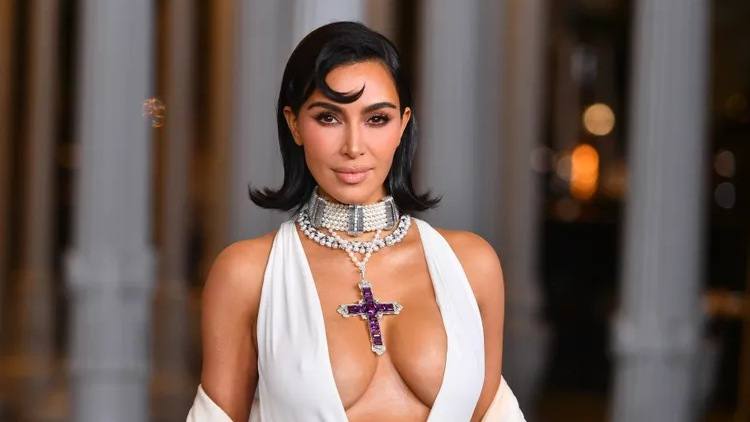 Kim Kardashian Turns Up the Heat in Shanghai in a Bronze Lingerie Catsuit
